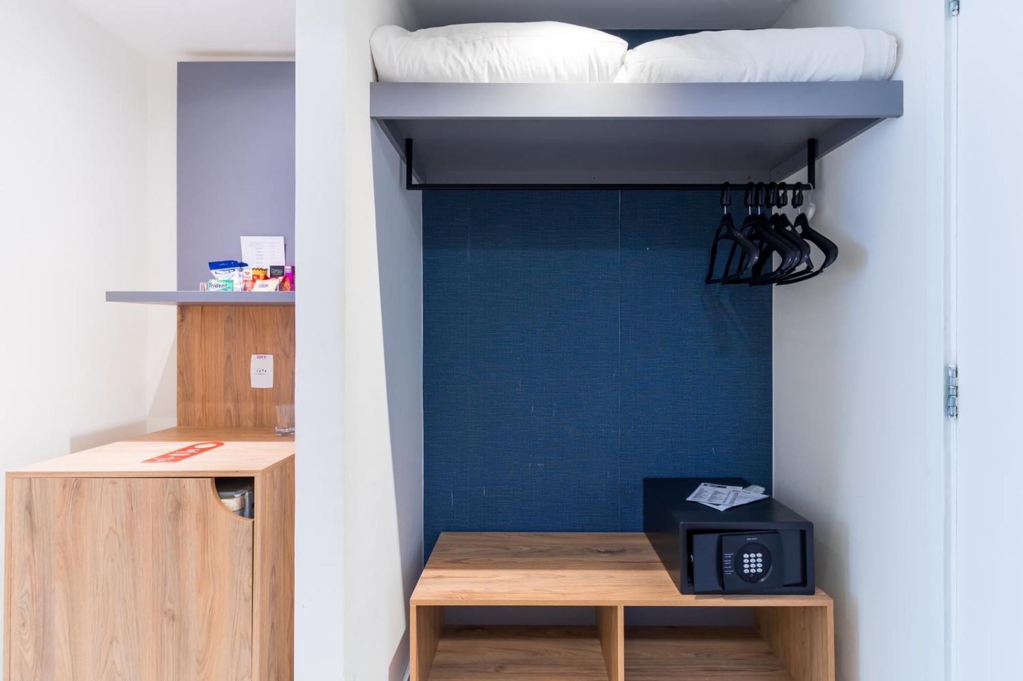 Parque Balneario Hotel Santos By Castelo Itaipava 객실 사진 A typical bedroom in the new halls of residence